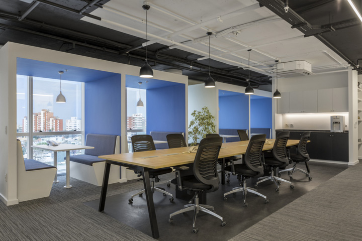 傳媒公司開放式辦公區(qū)布置實景圖